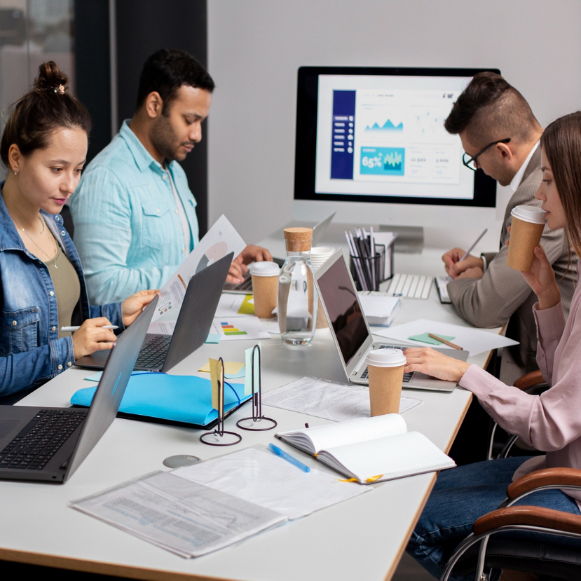 Our team collaborating on Microsoft solutions in a modern office environment